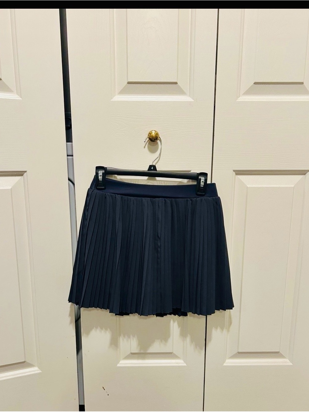 FLX NAVY BLUE PLEADED SKIRT